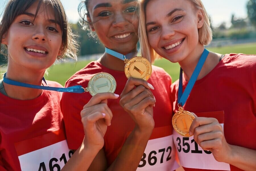 people with race medals